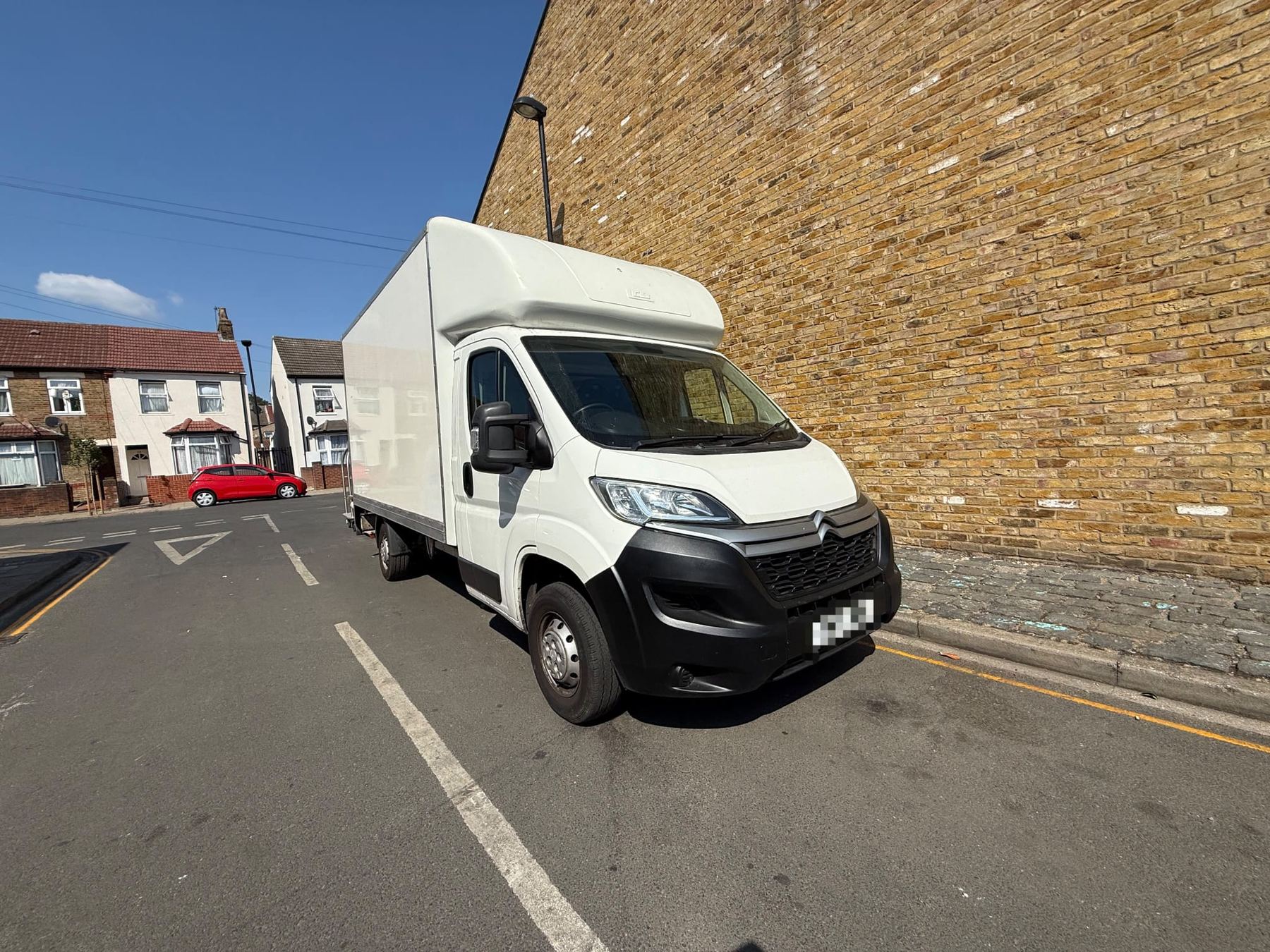 Carry Folk Luton van parked in West London